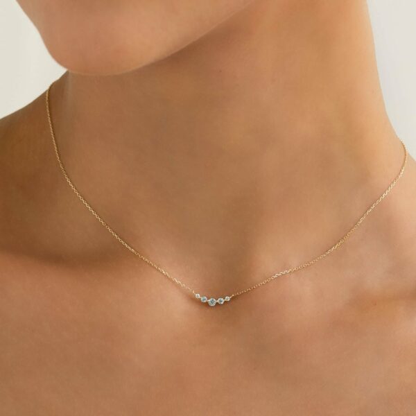 Taralynn-1-5-stone-arc-necklace-14k-model-0166-edit-cropped-final-v2-2.jpg