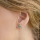 Taralynn-1-swiss-blue-topaz-halo-earring-14k-model-0130-edit-final-2-cropped-final-2_81e5510e-bedf-401d-80e8-6068371febca