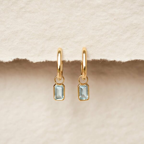 keira-18-amelia-huggie-earrings-with-sky-blue-topaz-baguette-charm-gv-lookbook-35-edit