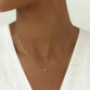 keira-28-estrella-necklace-14k-wg-model-112-cropped.jpg