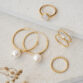 rebecca-pearl-hoop-earrings-gold-vermeil-lisbeth-moonstone-ring-trina-baguette-ring-dagmar-twist-ring-irene-beaded-ring-1