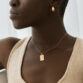 zodiac-charm-necklace-gv-gemini-jorunn-hoops-gv-styled_afb4e221-1b63-44de-aaa3-771919b699b3.jpg